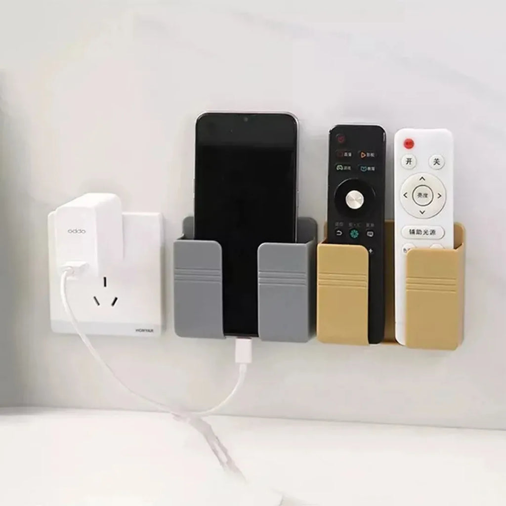 SOPORTE PARA TELÉFONO MÓVIL CON ORGANIZADOR DE CARGA – MONTAJE EN PARED, AHORRO DE ESPACIO Y USO SEGURO JUNTO A ENCHUFES
