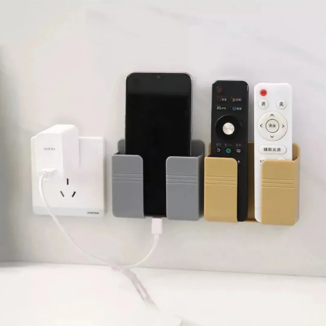 SOPORTE PARA TELÉFONO MÓVIL CON ORGANIZADOR DE CARGA – MONTAJE EN PARED, AHORRO DE ESPACIO Y USO SEGURO JUNTO A ENCHUFES