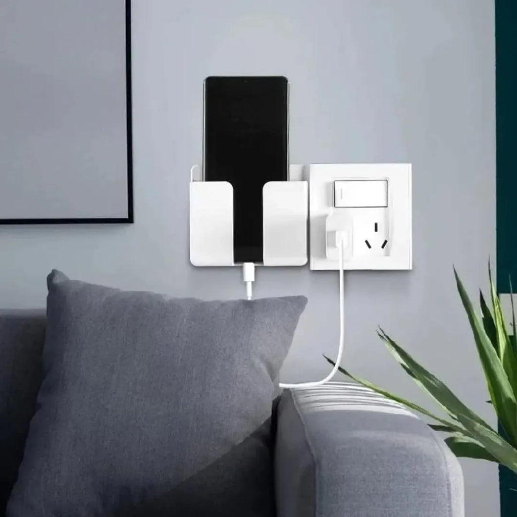 SOPORTE PARA TELÉFONO MÓVIL CON ORGANIZADOR DE CARGA – MONTAJE EN PARED, AHORRO DE ESPACIO Y USO SEGURO JUNTO A ENCHUFES